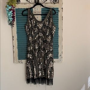 Size large (10/12) gold and black flapper dress
